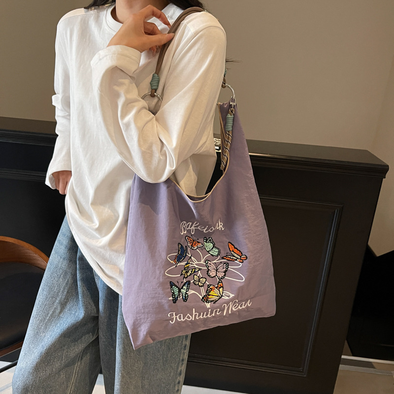 Women's large capacity single-shoulder carry-on shopping bag embroidered environmentally friendly bag niche design commuter tote bag
